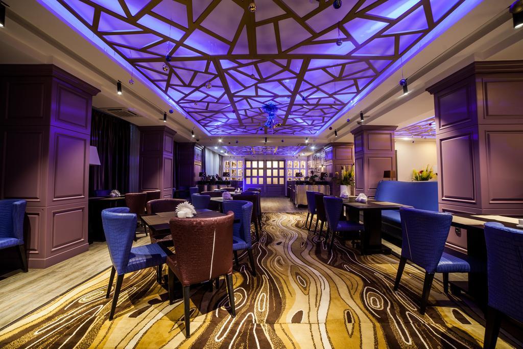 Absolute Hotel Астана Экстерьер фото