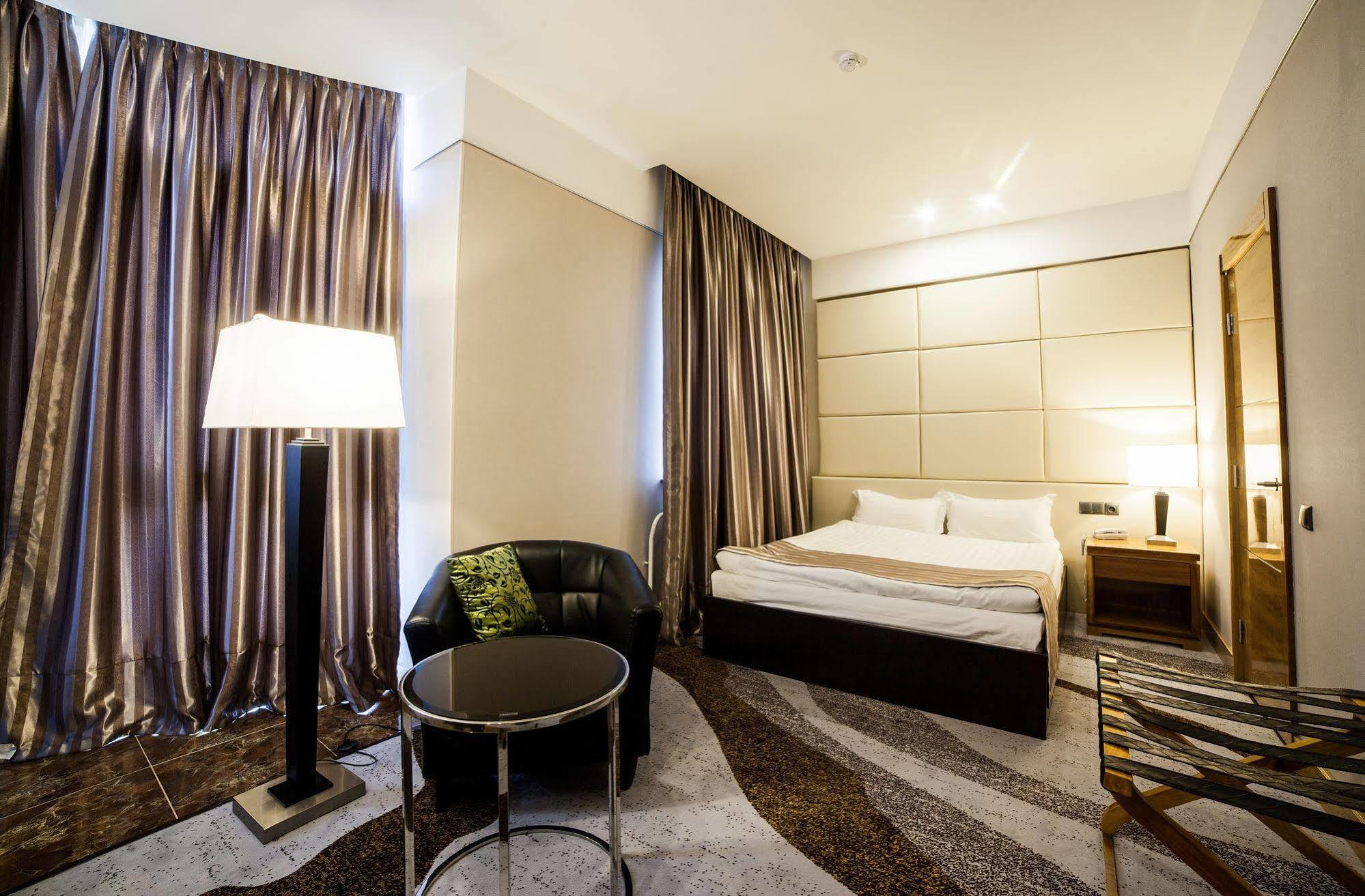 Absolute Hotel Астана Экстерьер фото